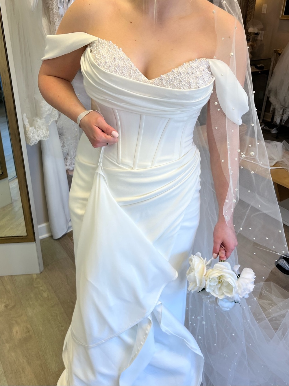 Off-Shoulder corset White Wedding Dress with Perl peekaboo top.
